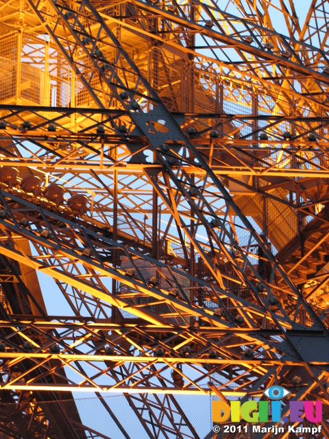 SX18663 Detail of lit up Eiffel tower at dusk